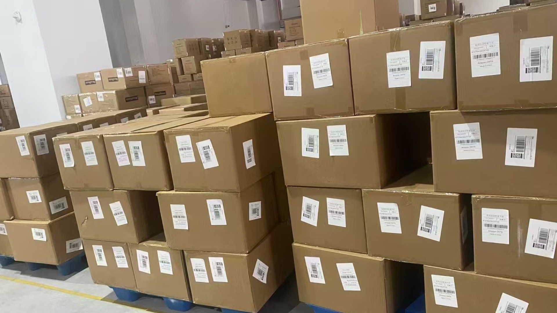 Warehouse cartons staged for export coordination.